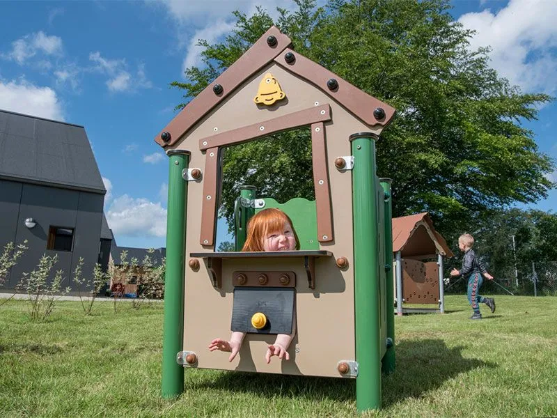 Miniplay Noa with a cheeky little girl on the playground Miniplay Noa with a cheeky little girl on the playground